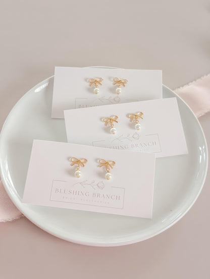 Nina - Pearl Bow Earrings Dainty 14k Gold Plated Bridal Studs